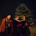 Three members of the Boychoir of Ann Arbor sing christmas carols after the tree lighting ceremony in Ypsilanti's Depot Town Saturday night. 
Courtney Sacco I AnnArbor.com 
